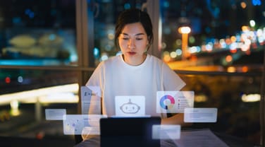 Young Asian businesswoman using AI