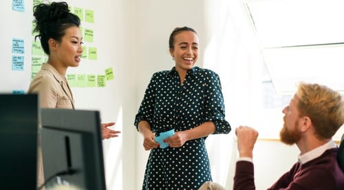 Agile working team standup meeting in the office
