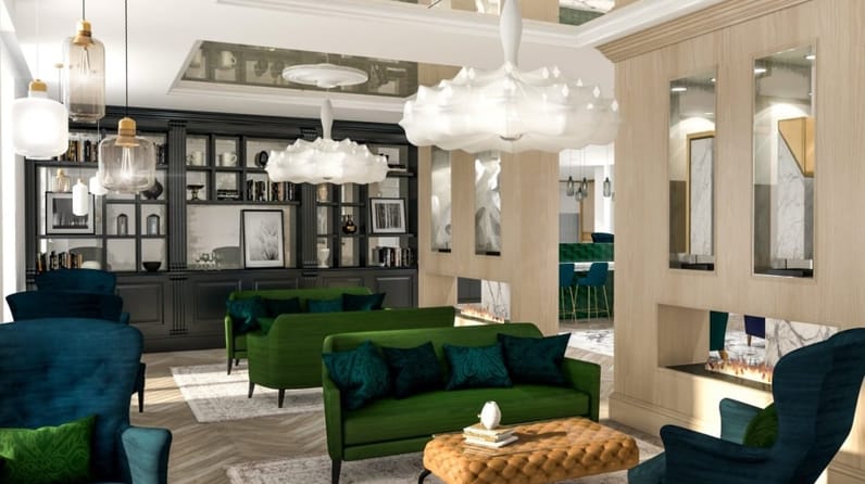 13 Hanover Square's breakout space with beautiful green sofas