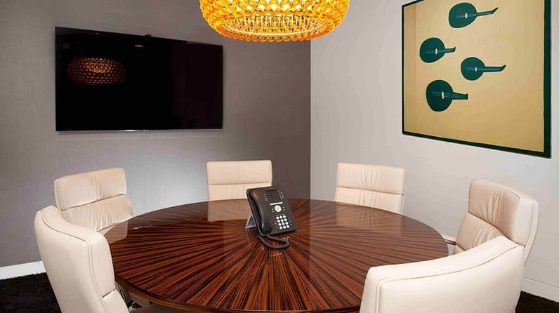 48 Dover Street's light-flooded open plan offices with floor to ceiling windows 