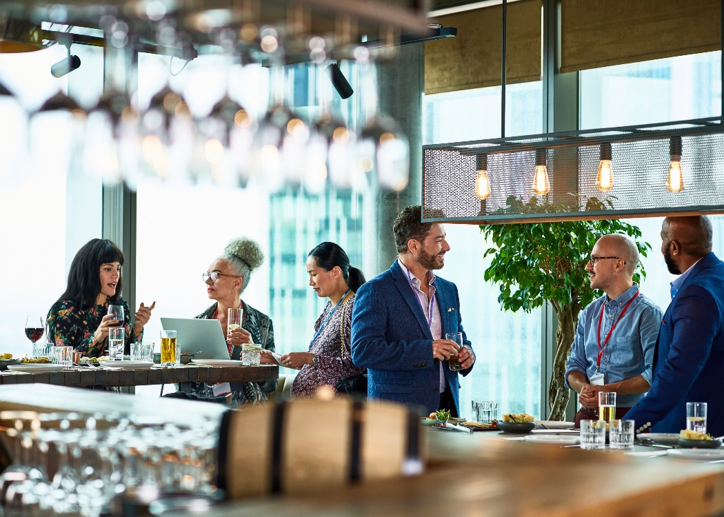Group of team members enjoying a drink
