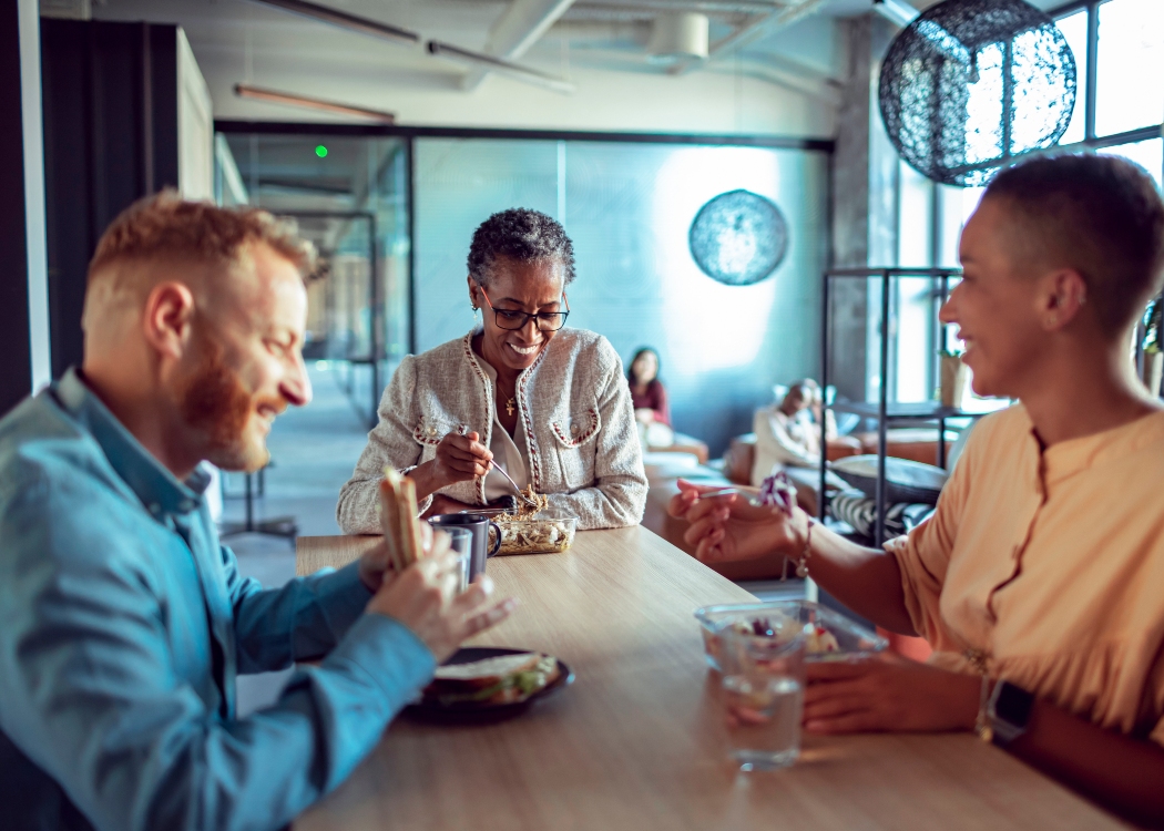 Colleagues having lunch together 
